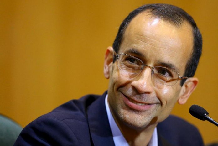 Odebrecht, the head of Latin America's largest engineering and construction company Odebrecht SA, smiles as he gives his testimony in a session of the Parliamentary Committee of Inquiry in Curitiba